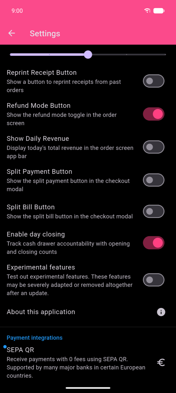 Settings screen with the Enable day closing toggle switched on (pink), labelled "Track cash drawer accountability with opening and closing counts", among several other feature toggles